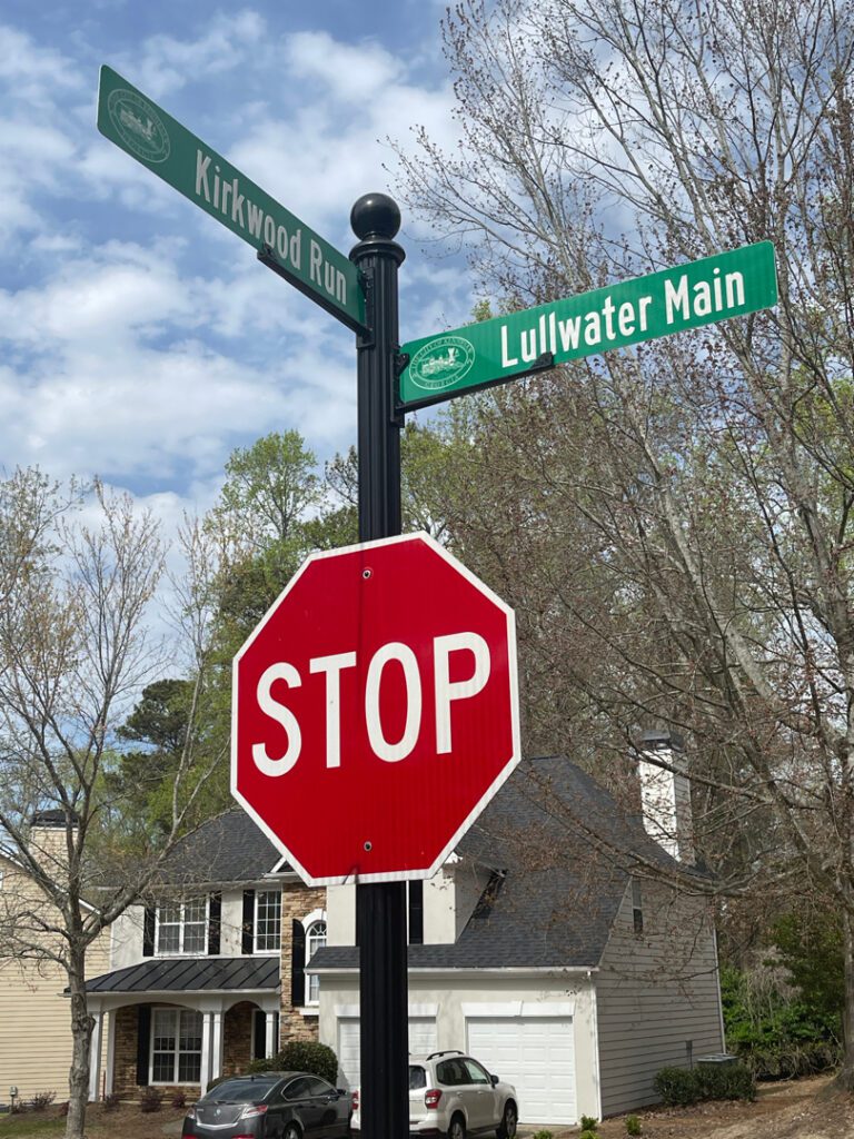 Photo of stop sign in a residential neighborhood.