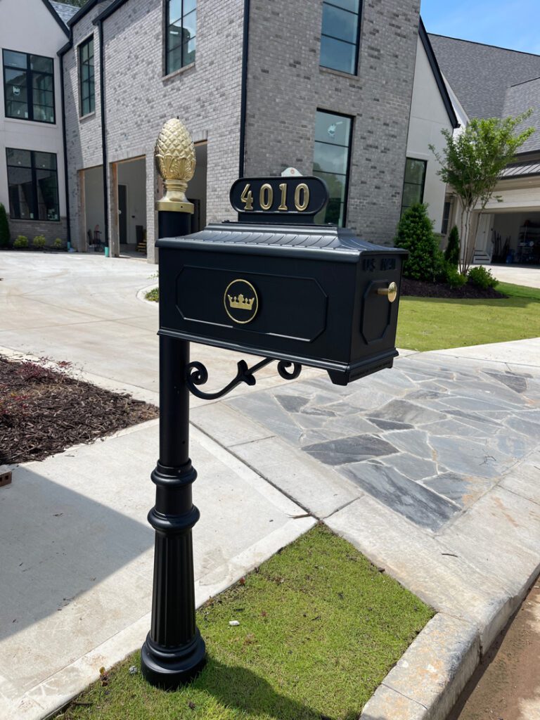 Custom mailbox design in a residential neighborhood.